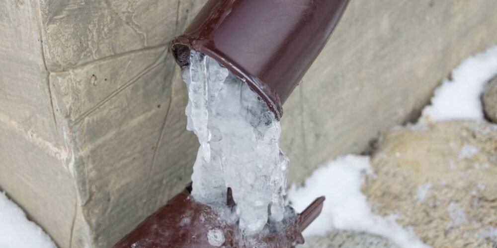 How to Deal with Frozen Downspouts After a Snowstorm?