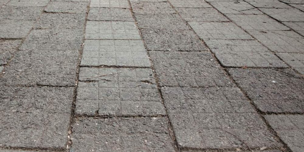 Can You Install Pavers Over a Concrete Walkway?